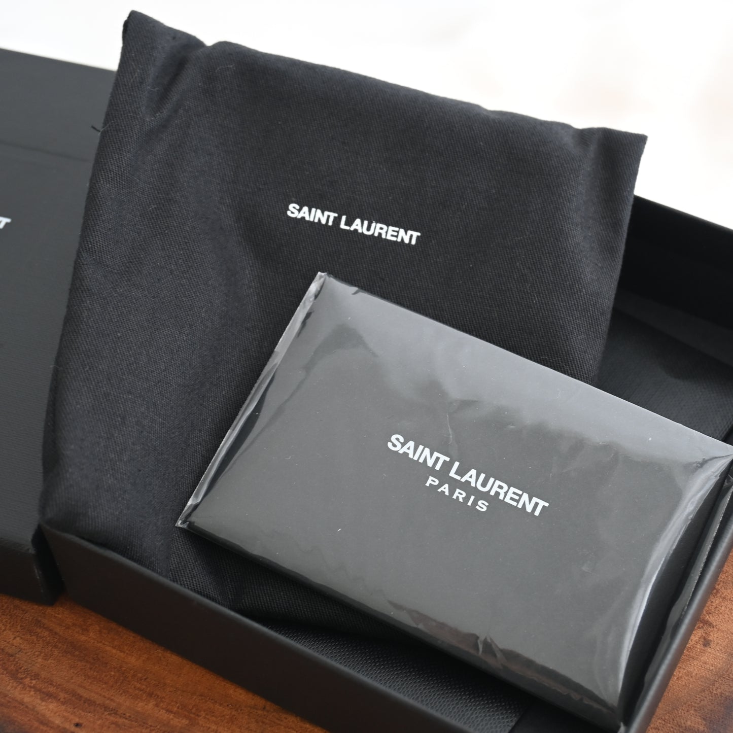 Yves Saint Laurent Black Leather Tiny Cassandre Bifold Wallet