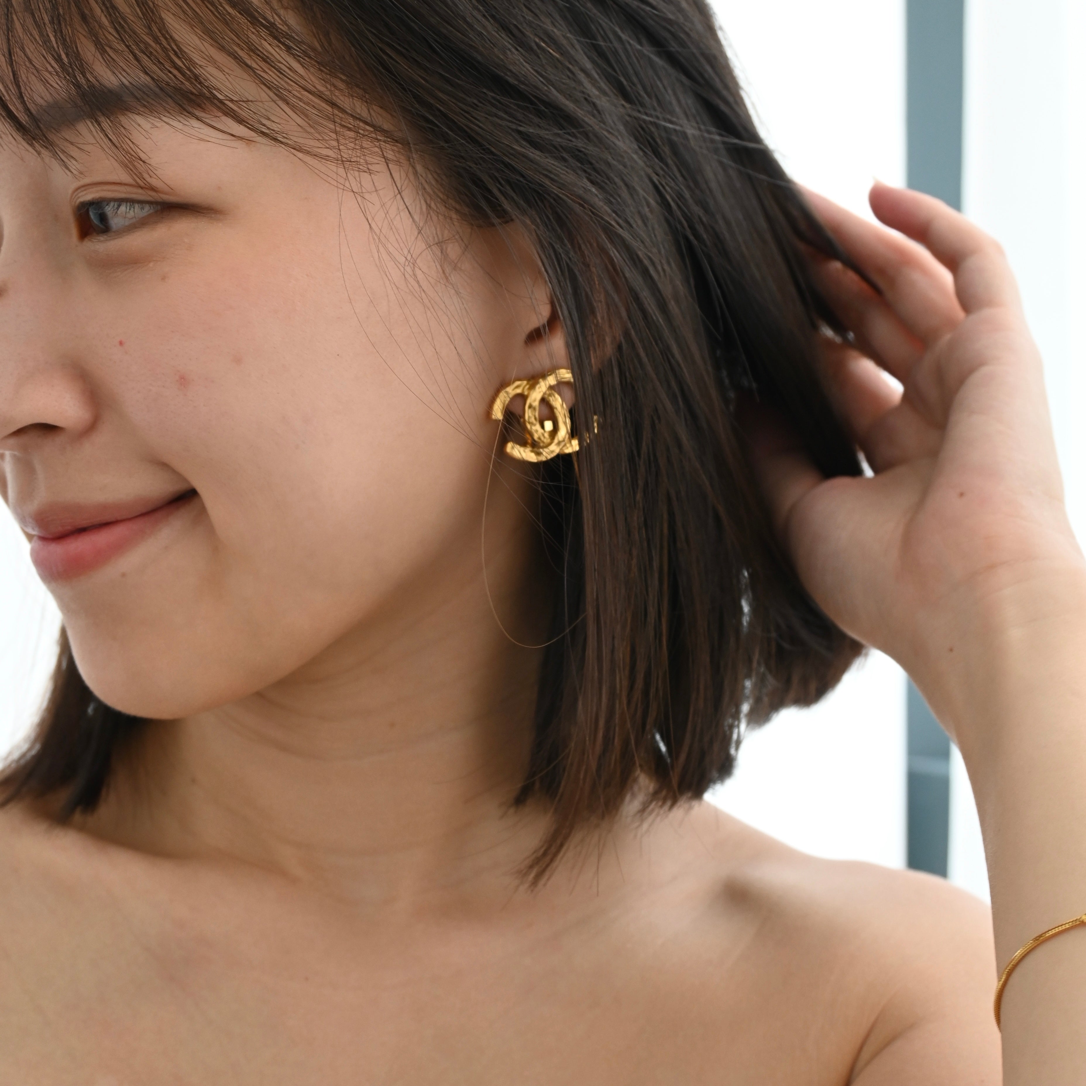 Chanel Coco Earclips with Hammered Texture - Leluxe Vintage Sdn. Bhd.