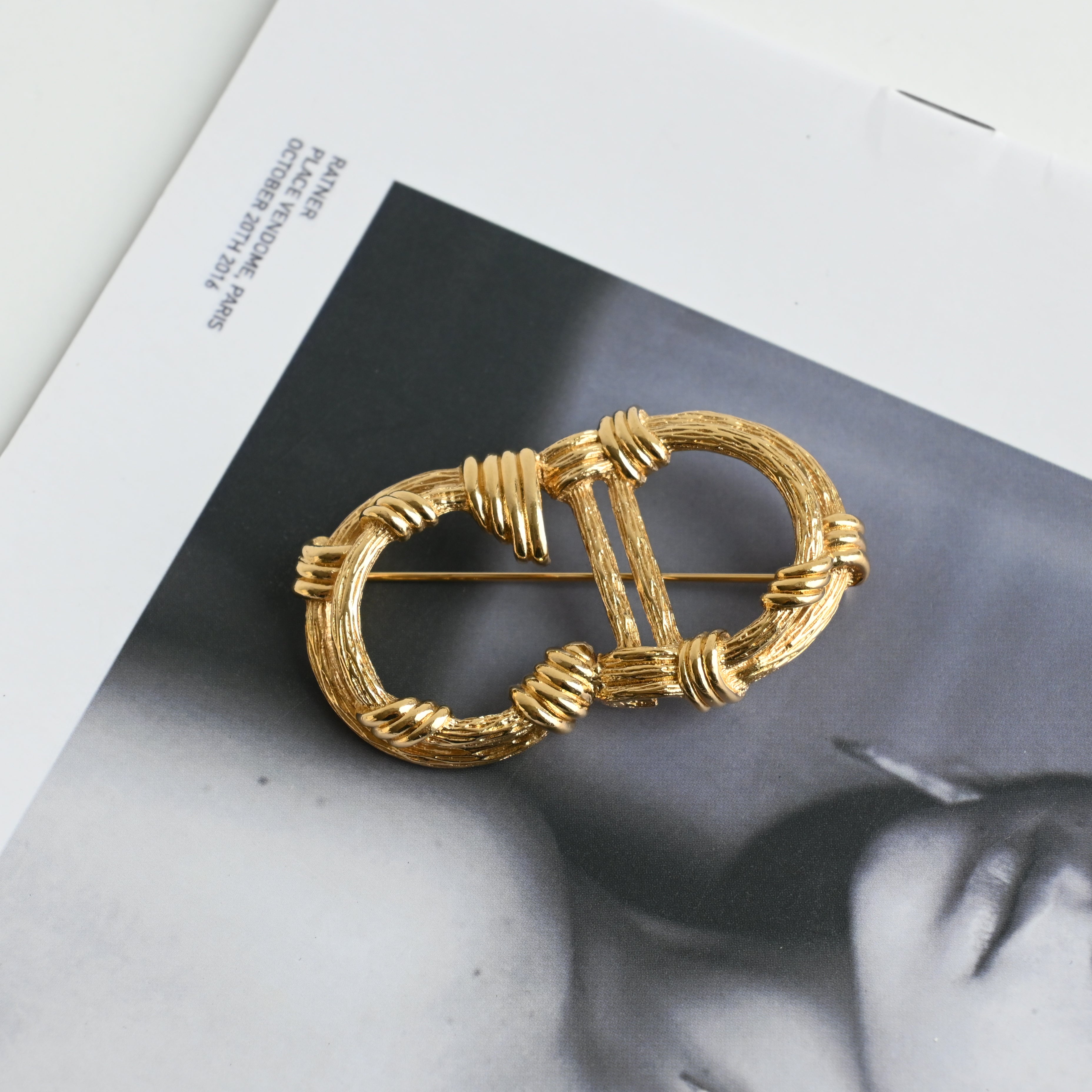 Christian Dior CD Logo Brooch with Twisted Motif