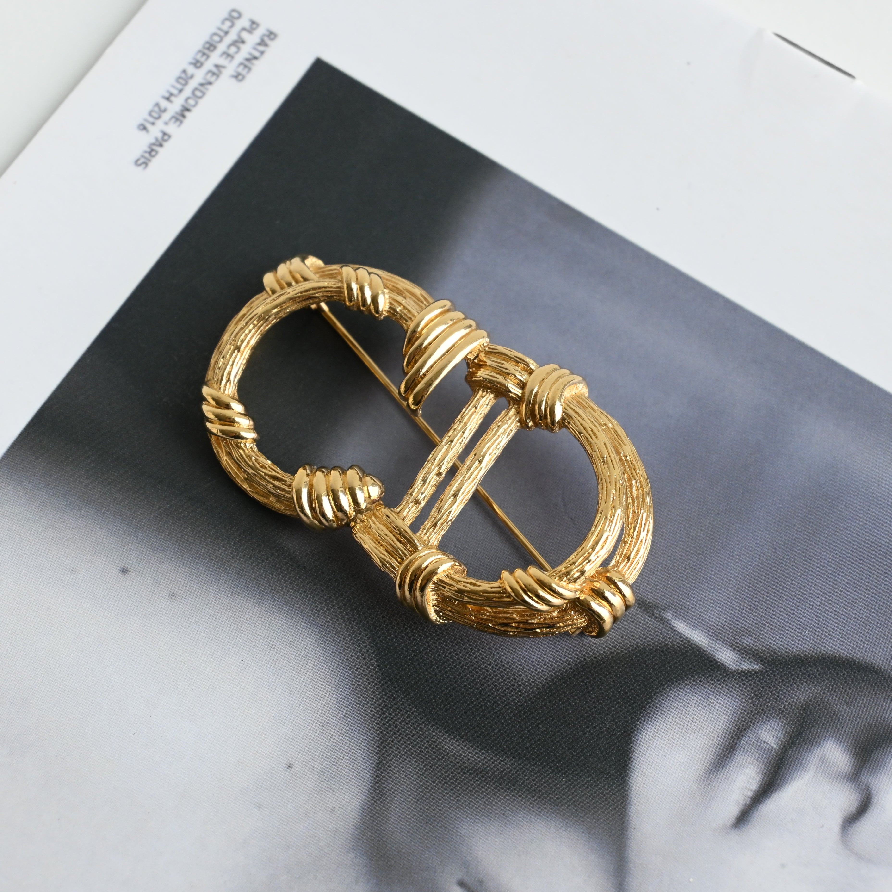 Christian Dior CD Logo Brooch with Twisted Motif