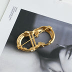 Christian Dior CD Logo Brooch with Twisted Motif