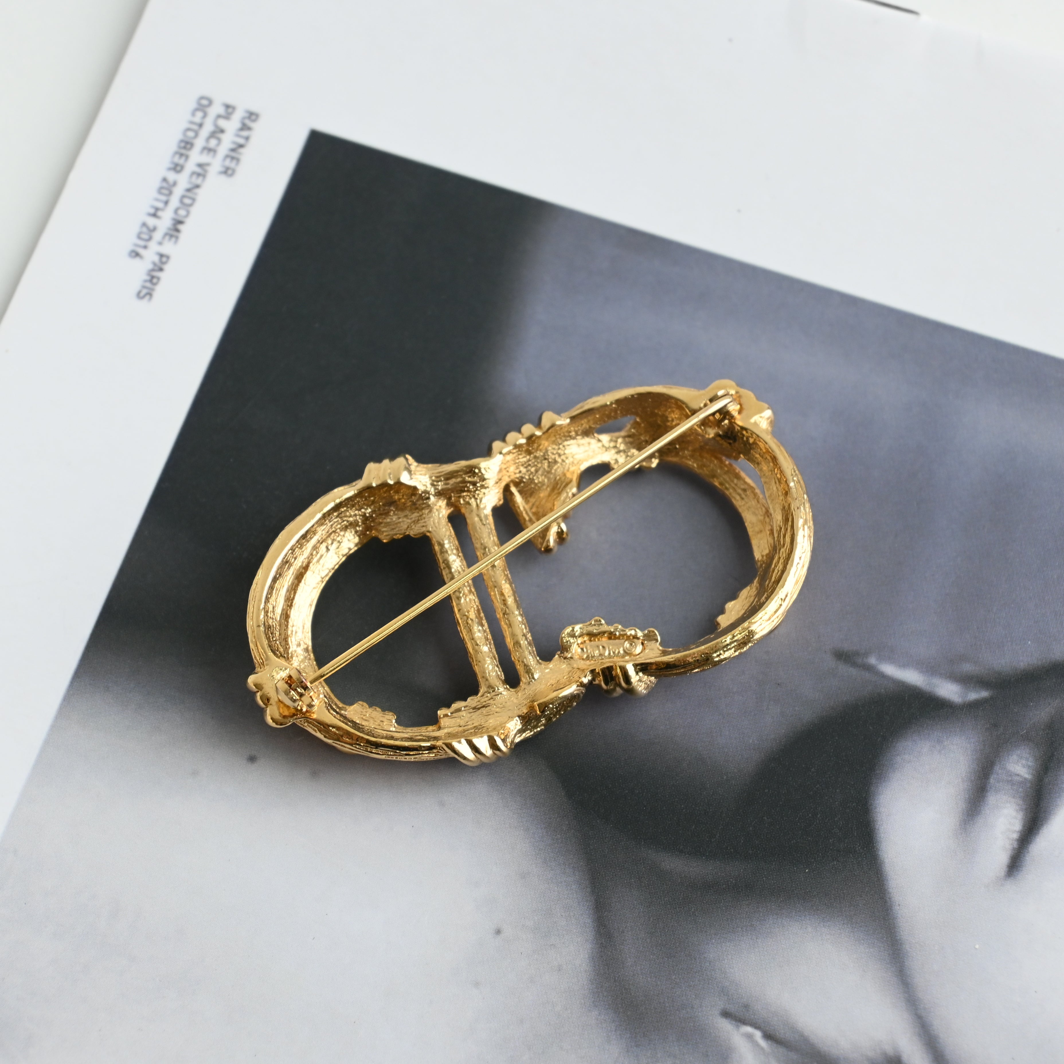 Christian Dior CD Logo Brooch with Twisted Motif