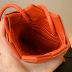 Bottega Veneta Mini Orange Nappa Intrecciato Pouch - Leluxe Vintage Sdn. Bhd.
