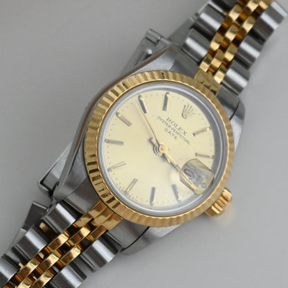 Rolex Oyster Perpetual Date ref. 69173 Champagne-Face