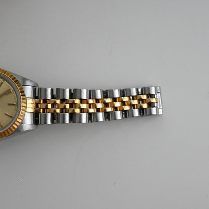 Rolex Oyster Perpetual Date ref. 69173 Champagne-Face