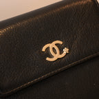 Chanel Coco Trifold Calfskin Wallet with Floral Charm Logo