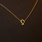 Tiffany & Co. Paloma Picasso Loving Heart Necklace 18K YG