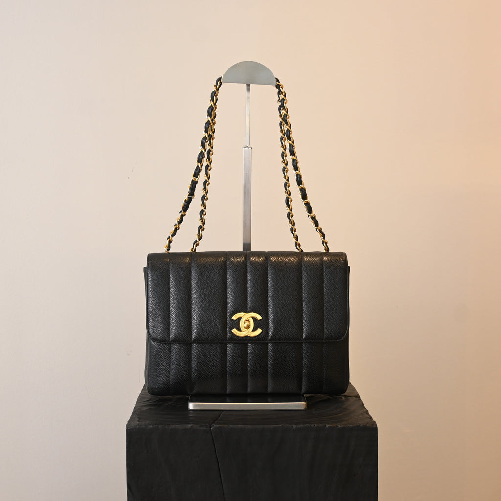 Chanel Black Caviar Vertical Mademoiselle Bag with 24K Gold Plated Hardware