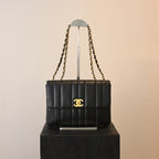 Chanel Black Caviar Vertical Mademoiselle Bag with 24K Gold Plated Hardware