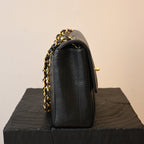 Chanel Black Caviar Vertical Mademoiselle Bag with 24K Gold Plated Hardware