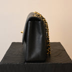 Chanel Black Caviar Vertical Mademoiselle Bag with 24K Gold Plated Hardware