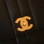 Chanel Black Caviar Vertical Mademoiselle Bag with 24K Gold Plated Hardware