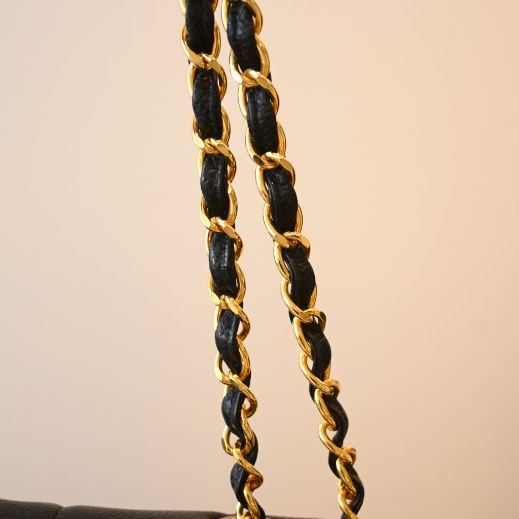Chanel Black Caviar Vertical Mademoiselle Bag with 24K Gold Plated Hardware
