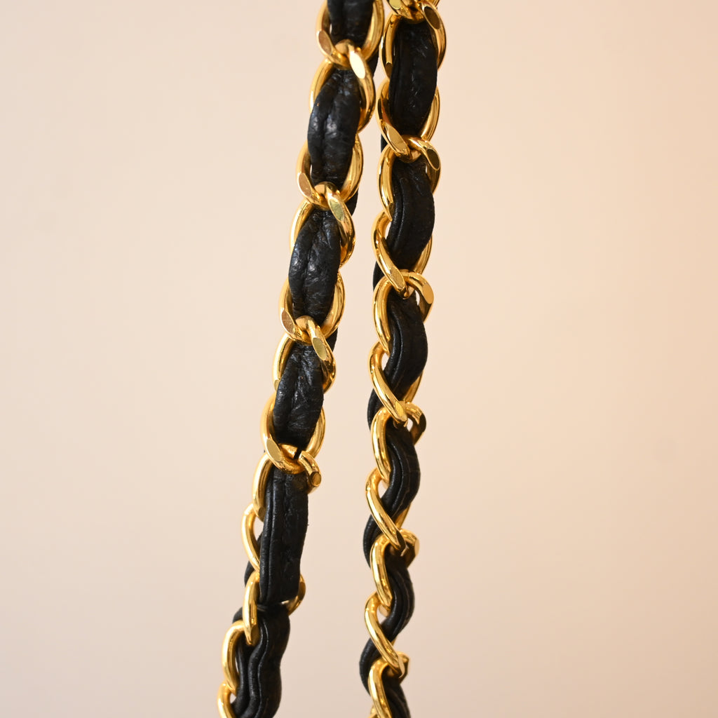 Chanel Black Caviar Vertical Mademoiselle Bag with 24K Gold Plated Hardware