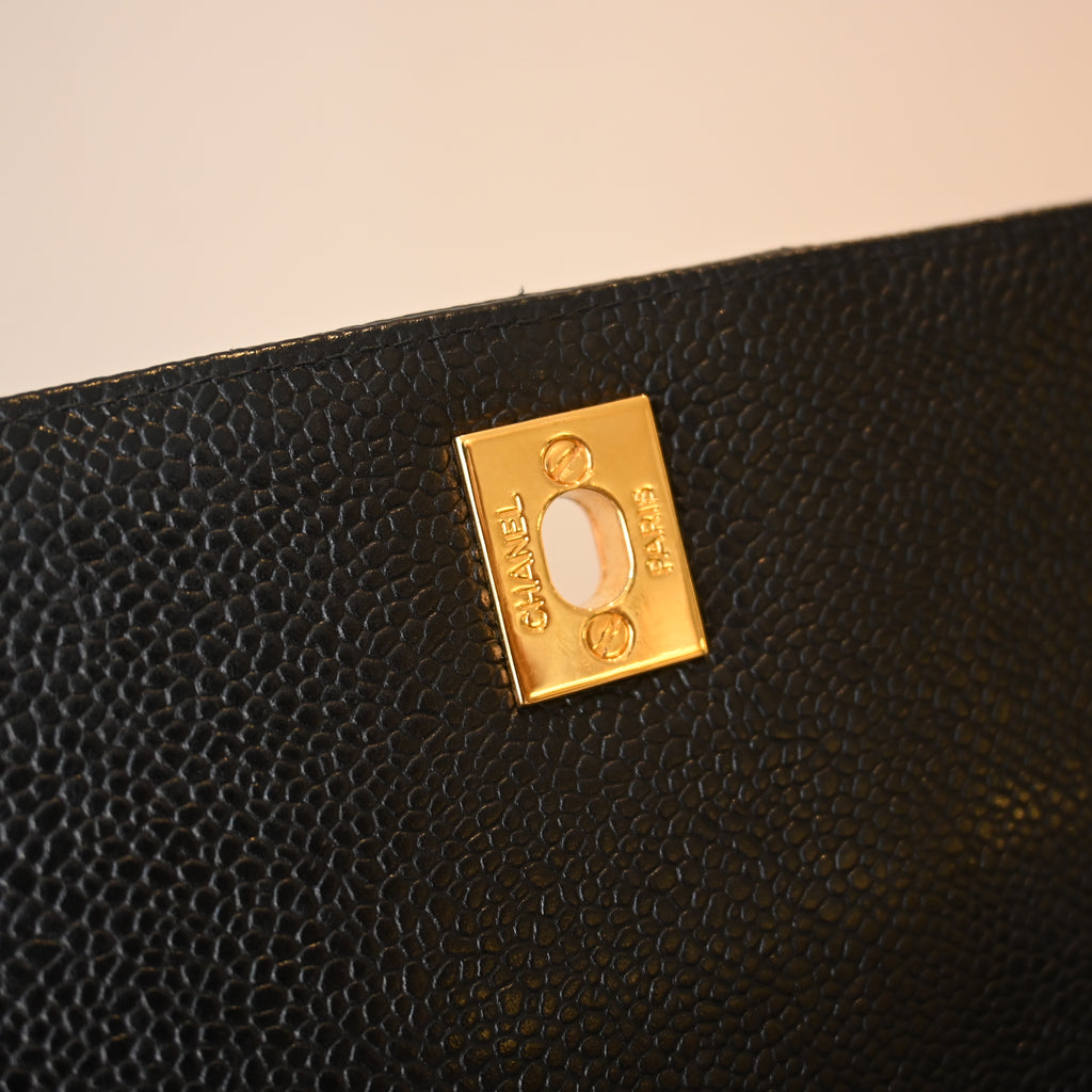 Chanel Black Caviar Vertical Mademoiselle Bag with 24K Gold Plated Hardware