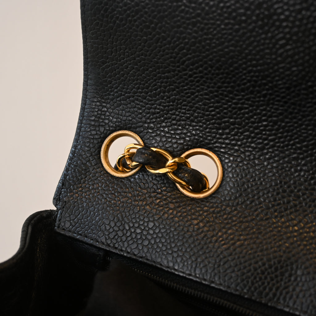 Chanel Black Caviar Vertical Mademoiselle Bag with 24K Gold Plated Hardware