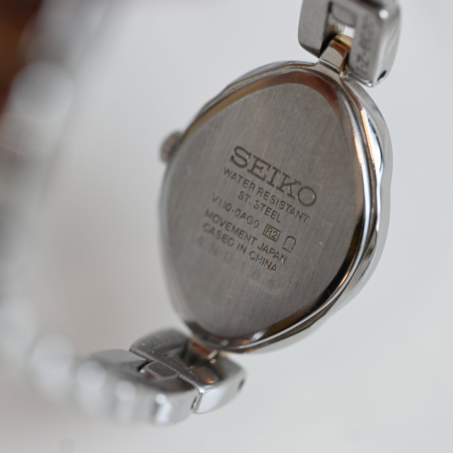 Seiko V110-0AG0 Solar Shell Dial Ladies Watch