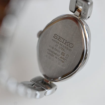 Seiko V110-0AG0 Solar Shell Dial Ladies Watch